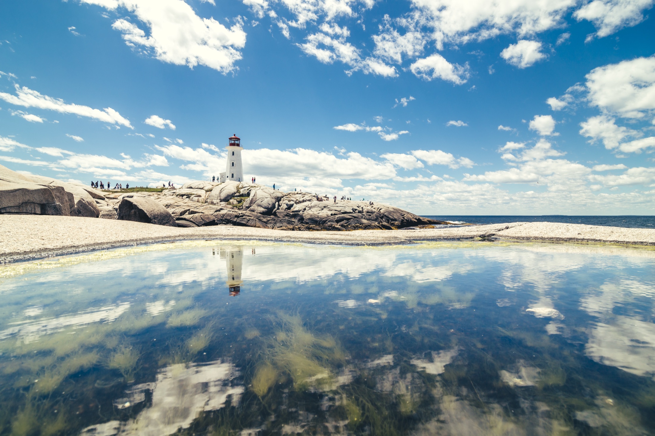 Peggy’s Cove lighthouse above the granite shoreline in Nova Scotia